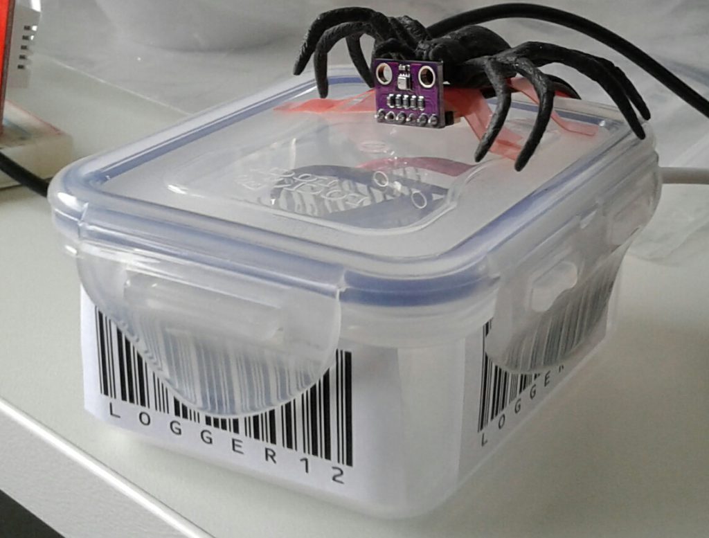 plastic spider on data logger