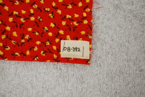 Another example of stapling the tag to the textile