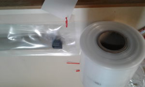 Roll of polyethylene tube for packing maps.