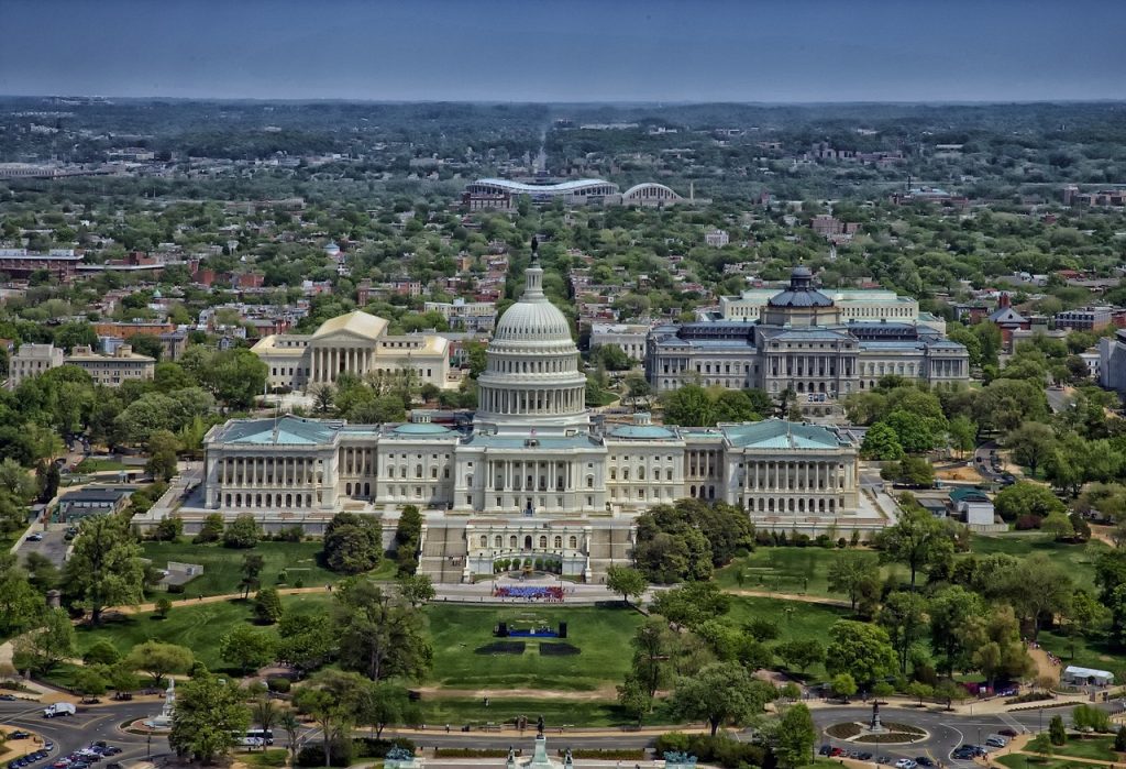 View on the Capitol and the city of Washington by day from a heightened position.